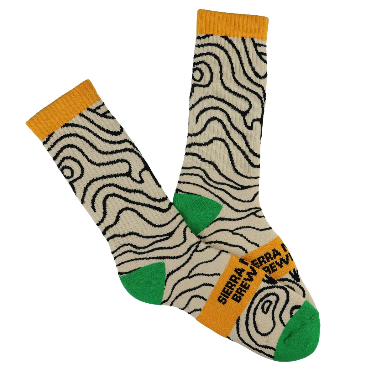 Pair of socks with wavy pattern and color block design on a white background