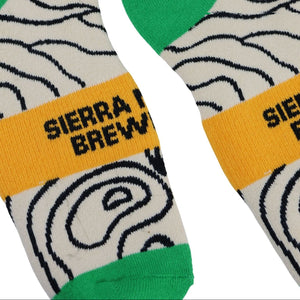 Thumbnail of Socks with wavy pattern and Sierra Nevada Brewing logo on a white background