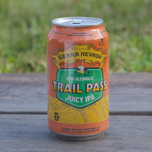 Thumbnail of A can of Sierra Nevada Trail Pass Juicy IPA sitting on a table outside