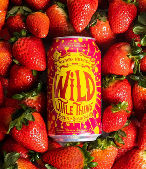 Thumbnail of Sierra Nevada Wild Little Thing can resting on a bed of fresh strawberries