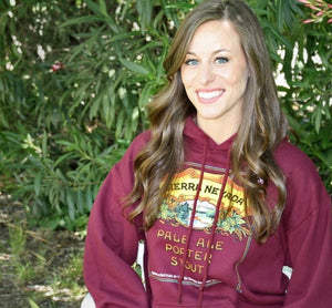 Thumbnail of Woman with brown hair wearing Pale Porter Stout maroon hoodie